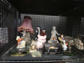 Cage of Hummel and other ornamental figures plus boxed car, ornamental kiwi and a table lamp