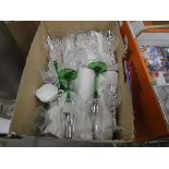 Box containing champagne glasses, tumblers and crested ware