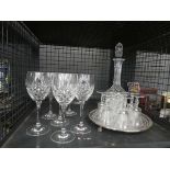 Cage containing a silver plated serving tray plus a decanter, sherry and wine glasses