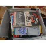 Box containing a quantity of football programmes