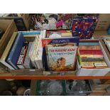 3 boxes containing paper back novels plus reference books and childrens annuals