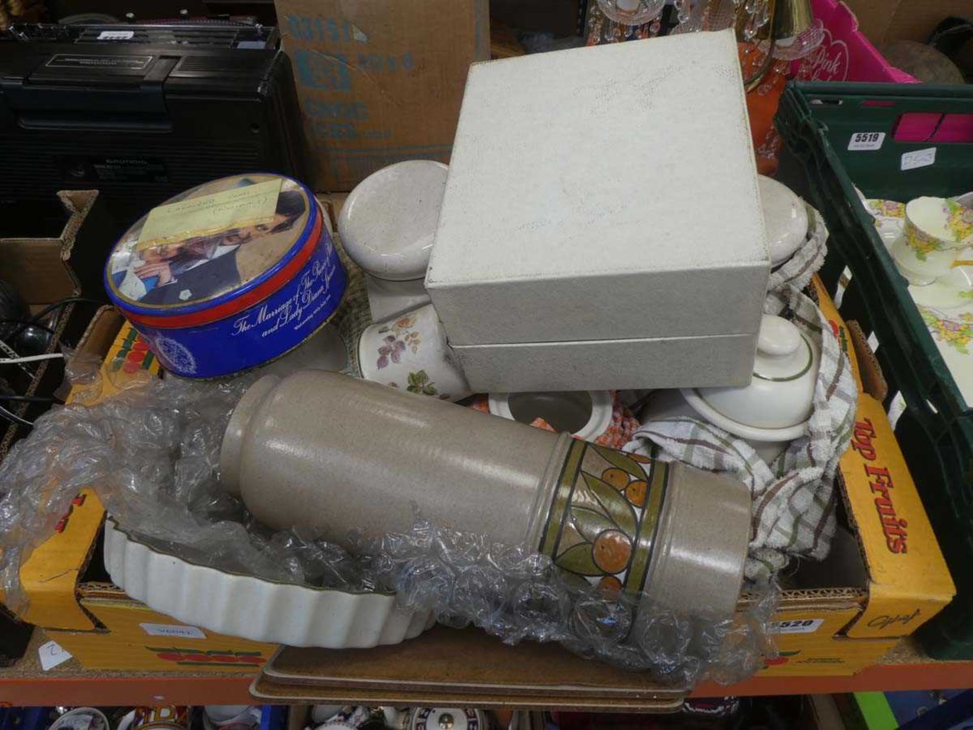 Box containing autumn leaf patterned crockery, plus carnival glass animals and studio pottery