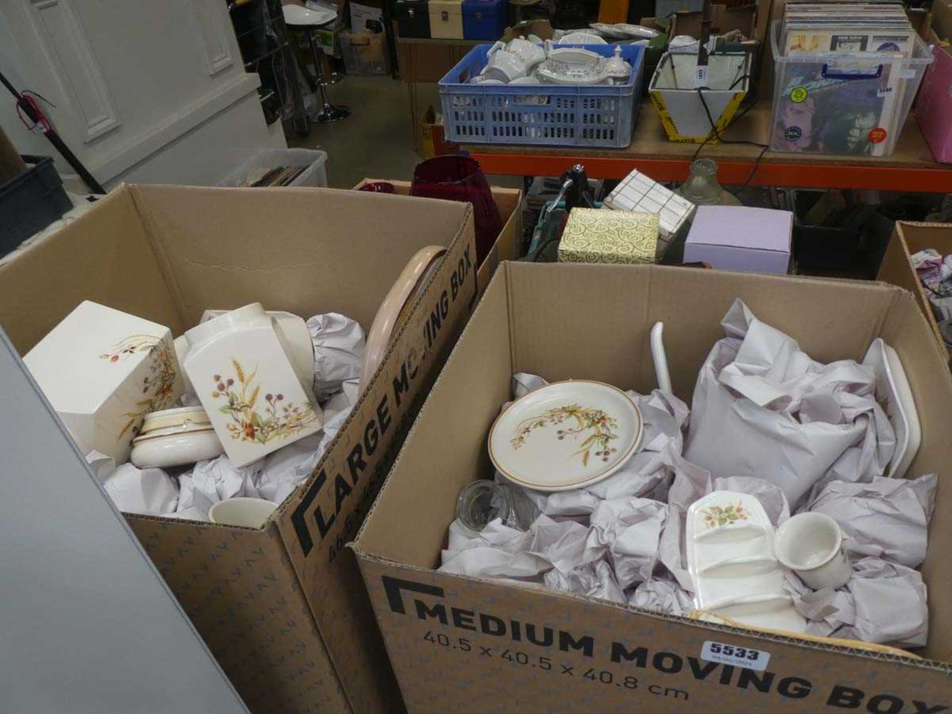 2 boxes containing harvest patterned crockery