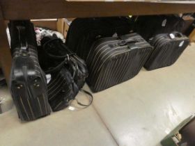 7 x handbags, satchels and travelling cases in striped fabric