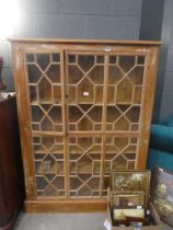 Stripped pine glazed bookcase - astragal detail One door doesn't stay closed, the glass is intact.