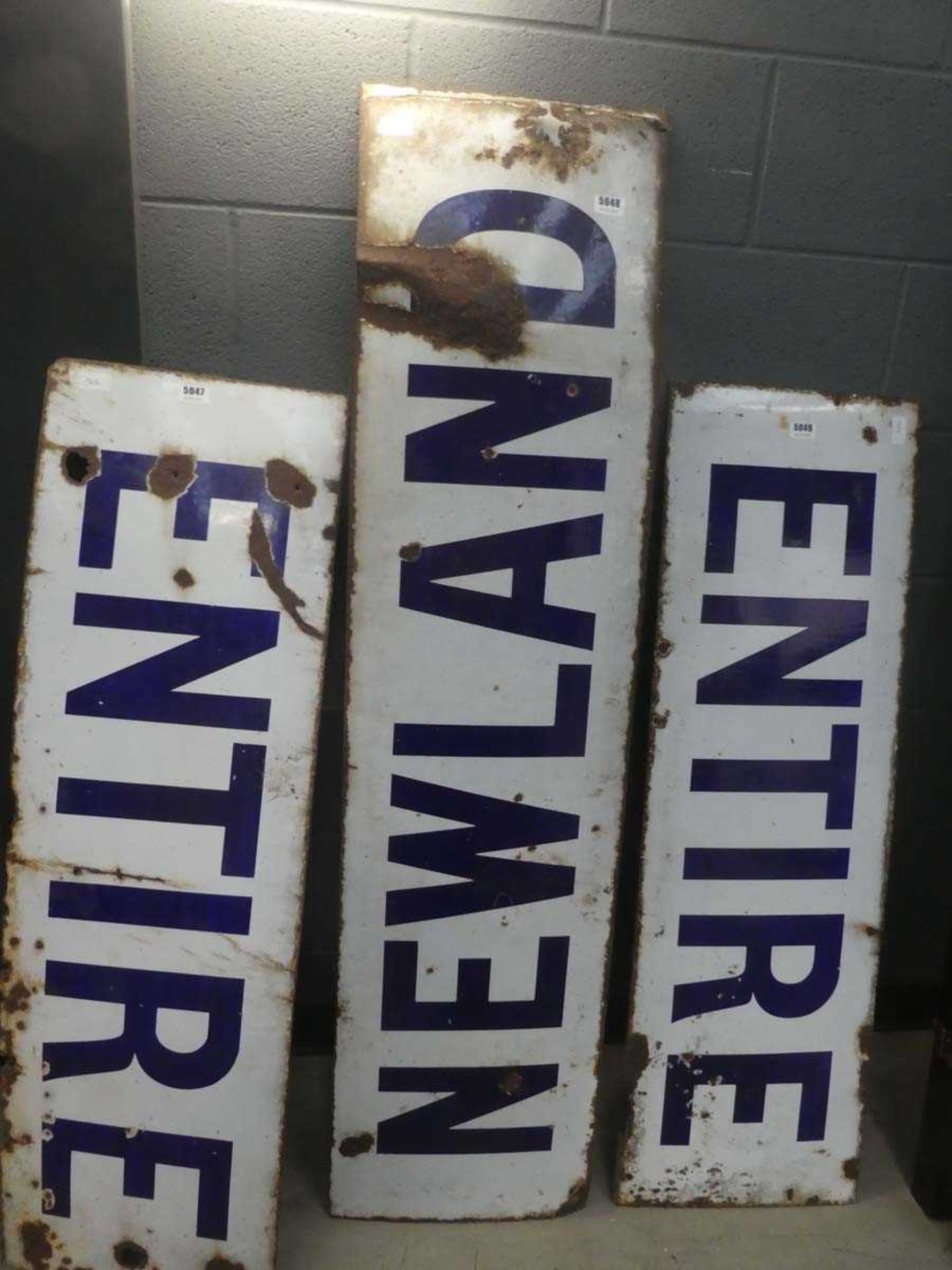 2 Newland enamelled signs