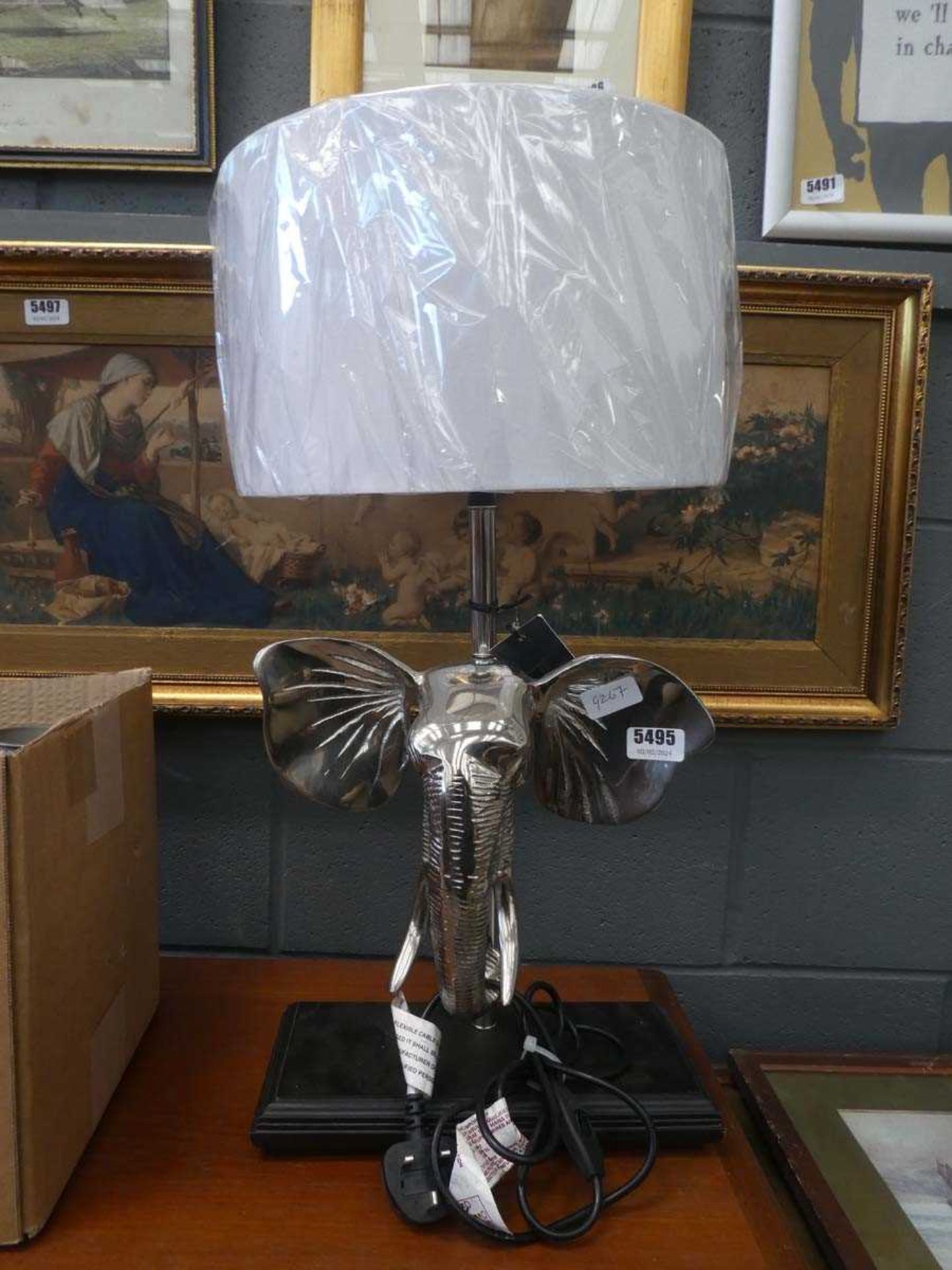Table lamp with elephant to the column