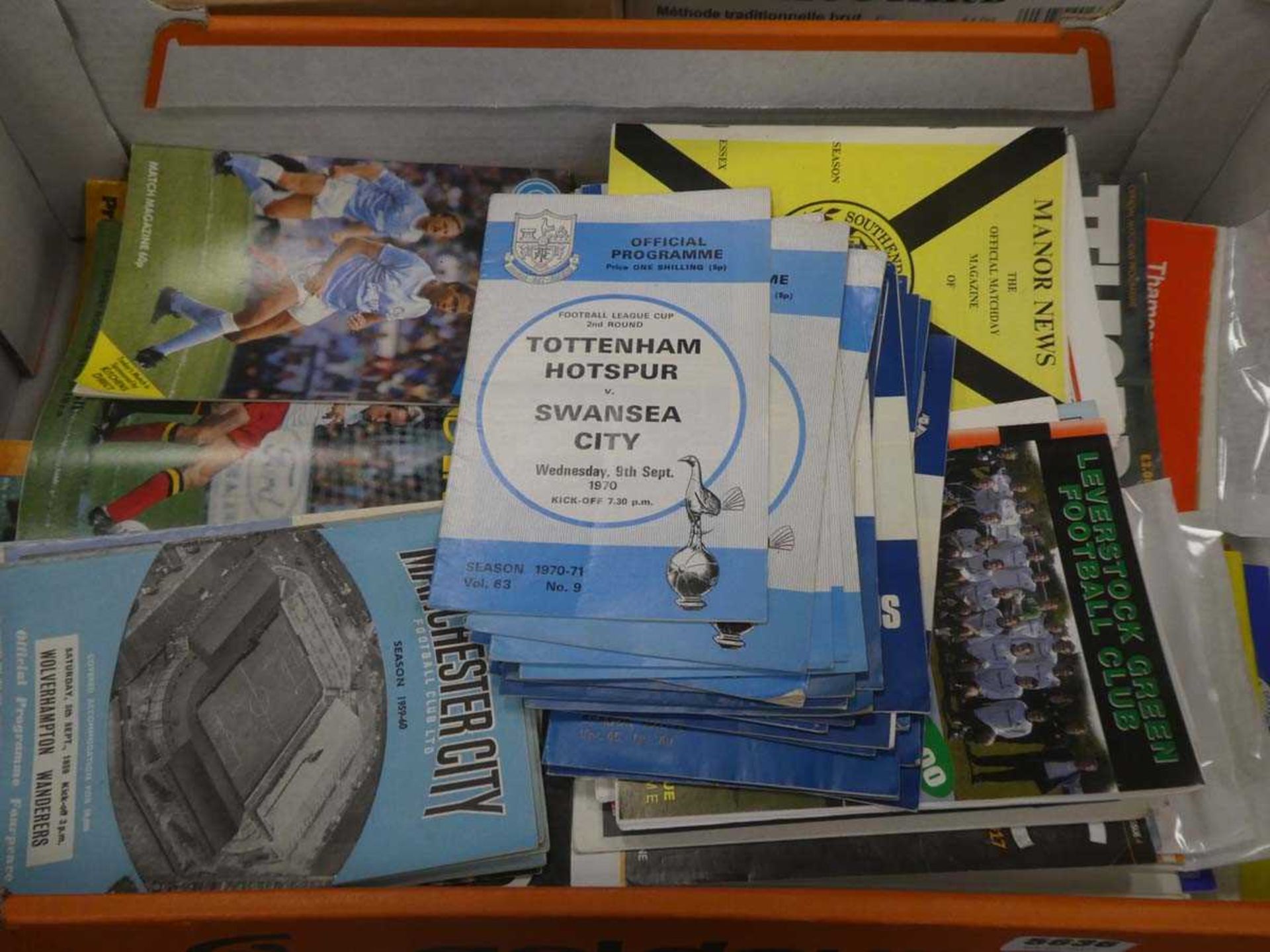 2 x boxes containing Tottenham Hotspur, Manchester City and other football programmes