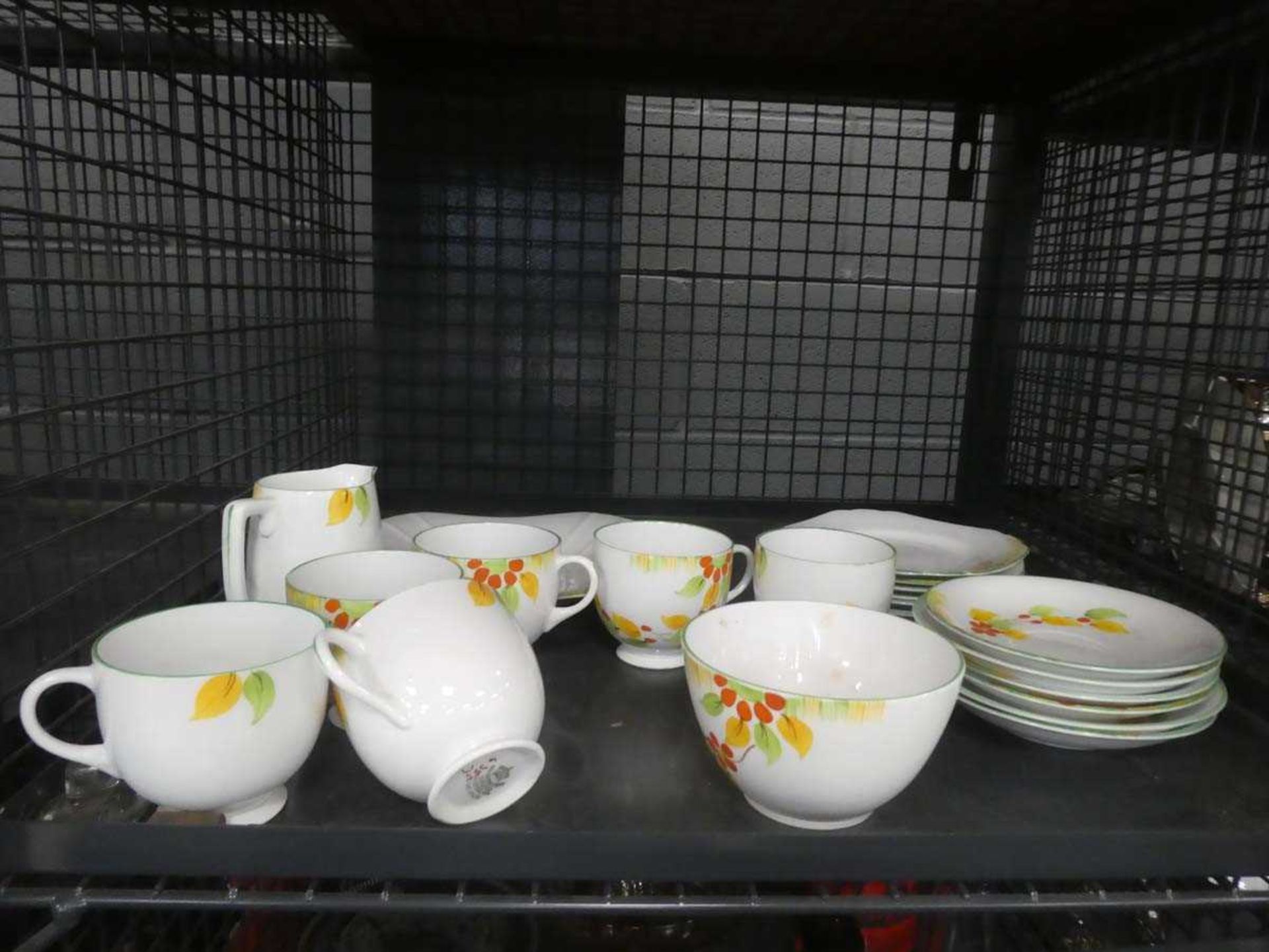 Cage containing quantity of Melba floral patterned crockery