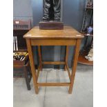 Oak side table with stretchers