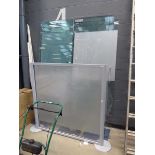 4 large glass doors and a glass panel on stand