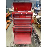 Red double section toolbox containing a large qty of assorted tools including screwdrivers, chisels,