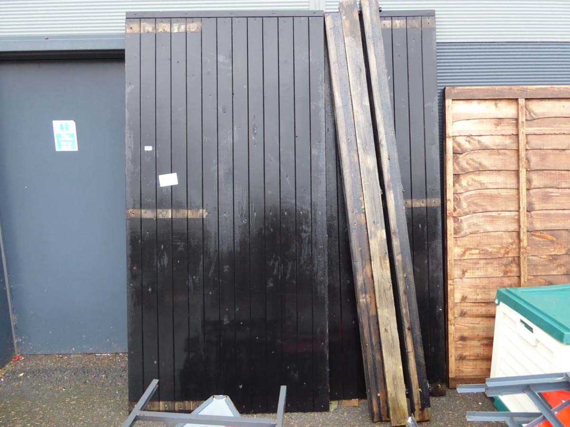 2 large black garage doors