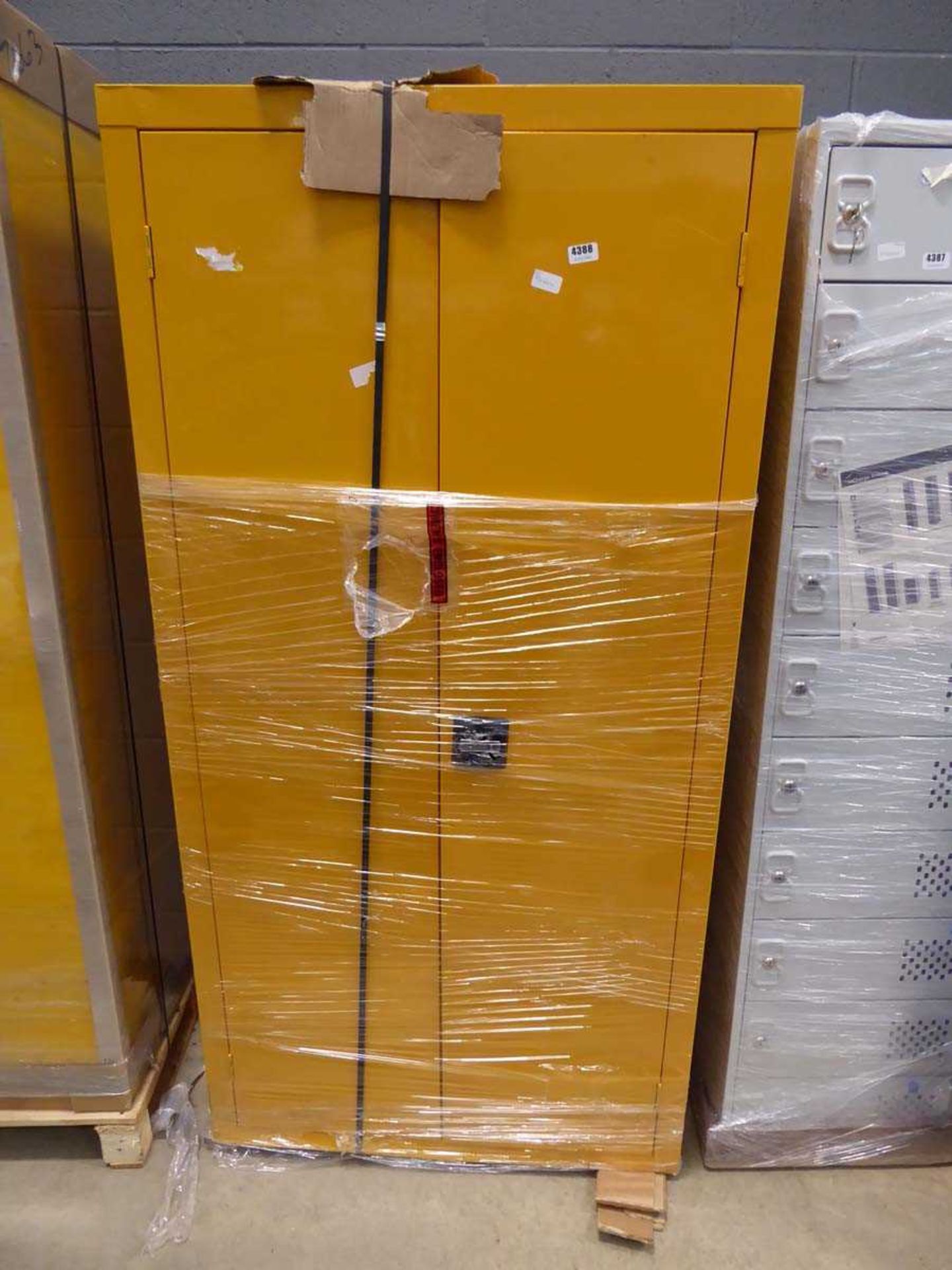 Large yellow 2 door stationery cupboard