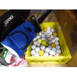 Box of golf balls and golf ball catcher