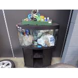 Large fish tank on stand with accessories