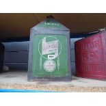 Vintage green tractor oil can