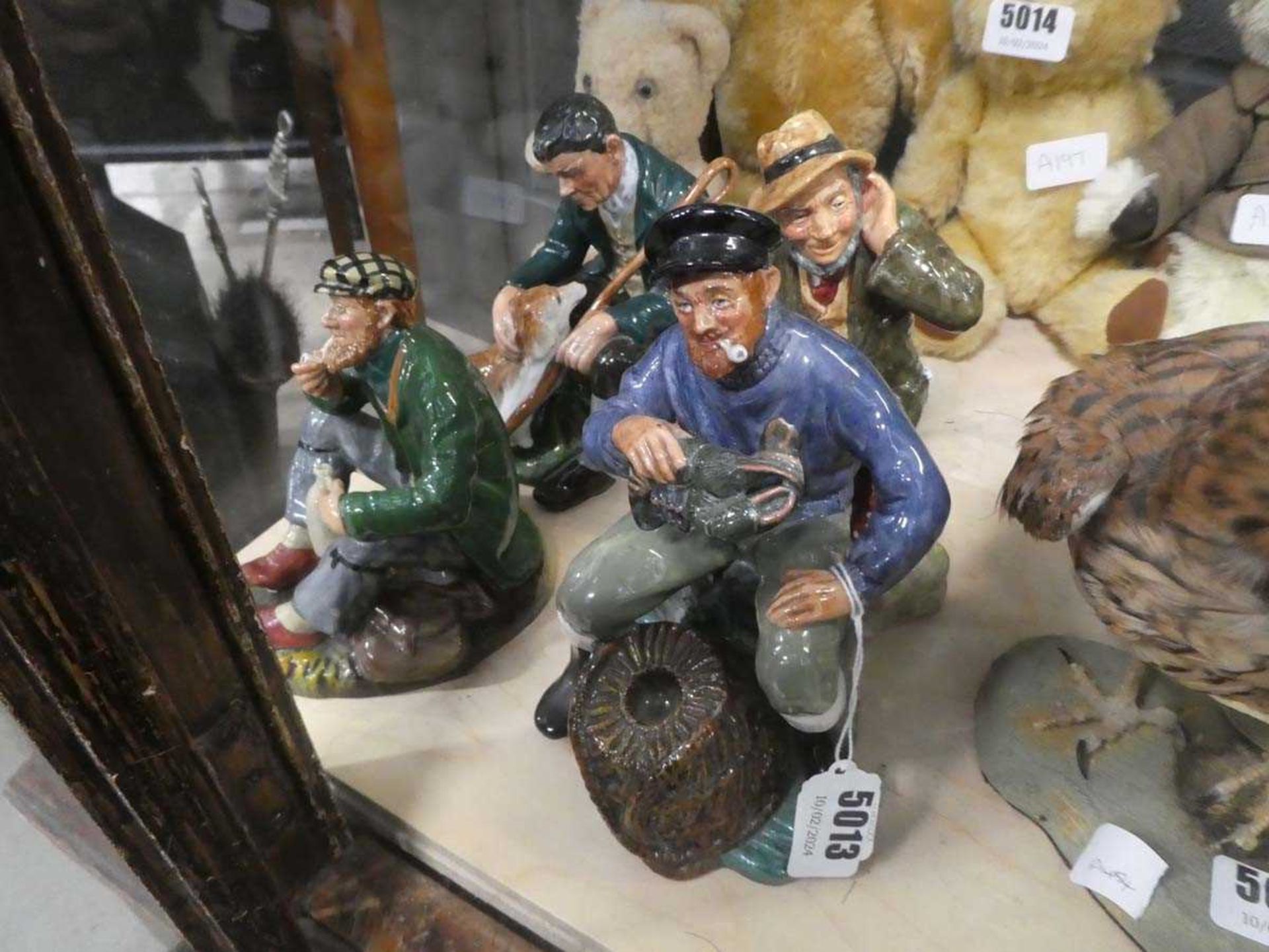 Four Royal Doulton figures: HN2042 Owd Willum, HN2317 The Lobster Man, HN2325 The Master and