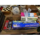 Box containing marbles, diecast cars and board games