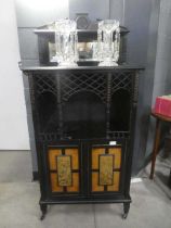 Double door aesthetic movement cabinet with mirrored gallery