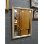 Rectangular bevelled mirror in gilt frame