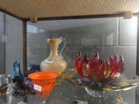 Nine pieces of coloured glass to include three bowls, four jugs and two ornamental birds