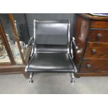 Chromed and black leather effect airport style seat