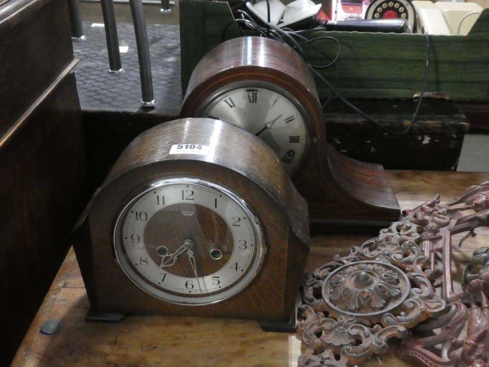 2 dome topped clocks