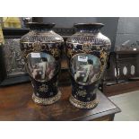 Pair of navy blue and gilt glazed vases with classical scenes