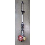 Red Mitox petrol powered long reach hedge cutter