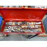 Red box containing various tools and sockets