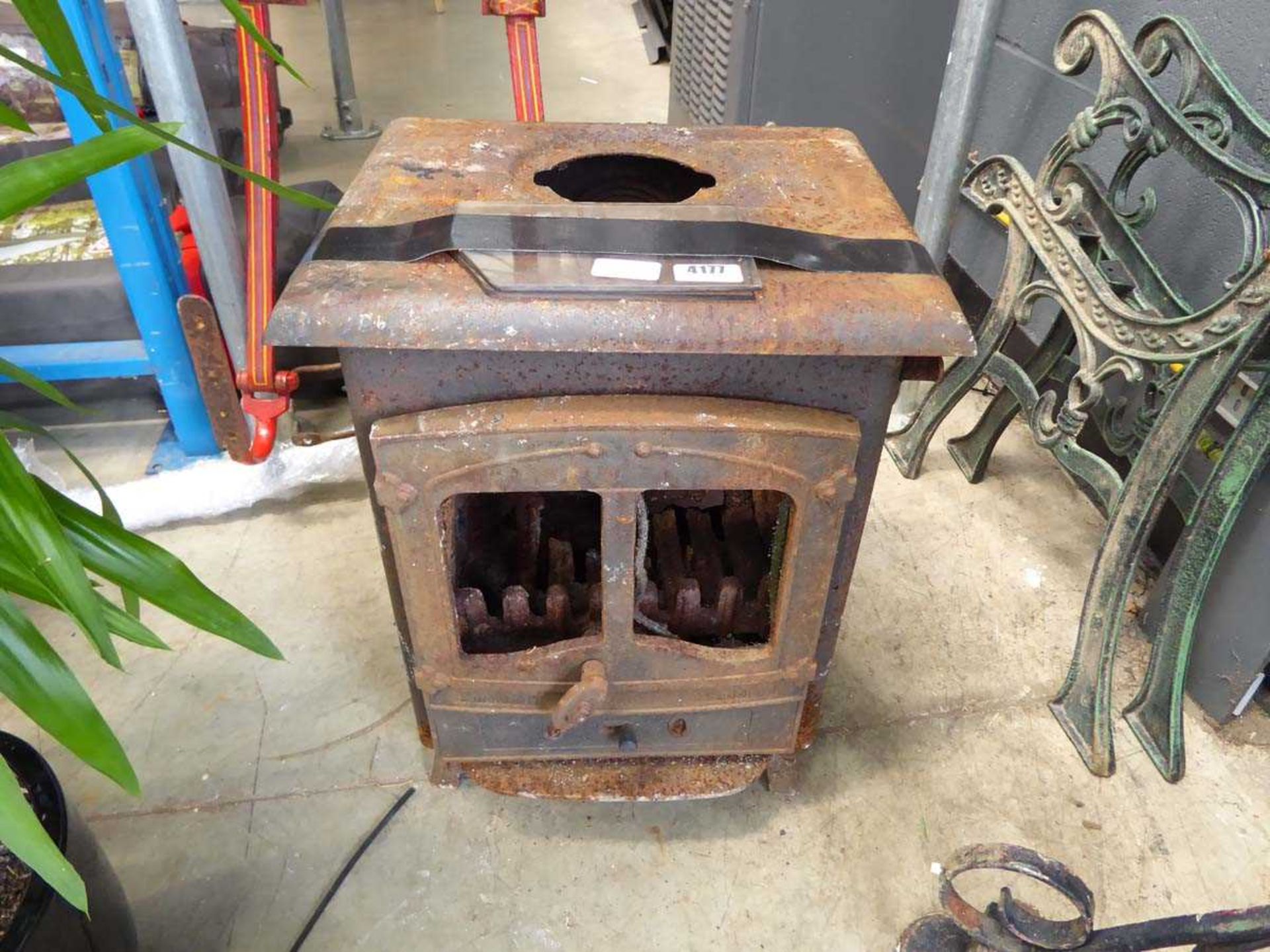 Wooden burner stove in need of repair
