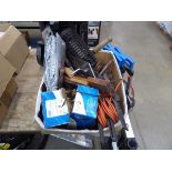 Box containing fly zapper, car cover, woodworking vice and various other tools