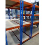 3 shelved orange and blue rack