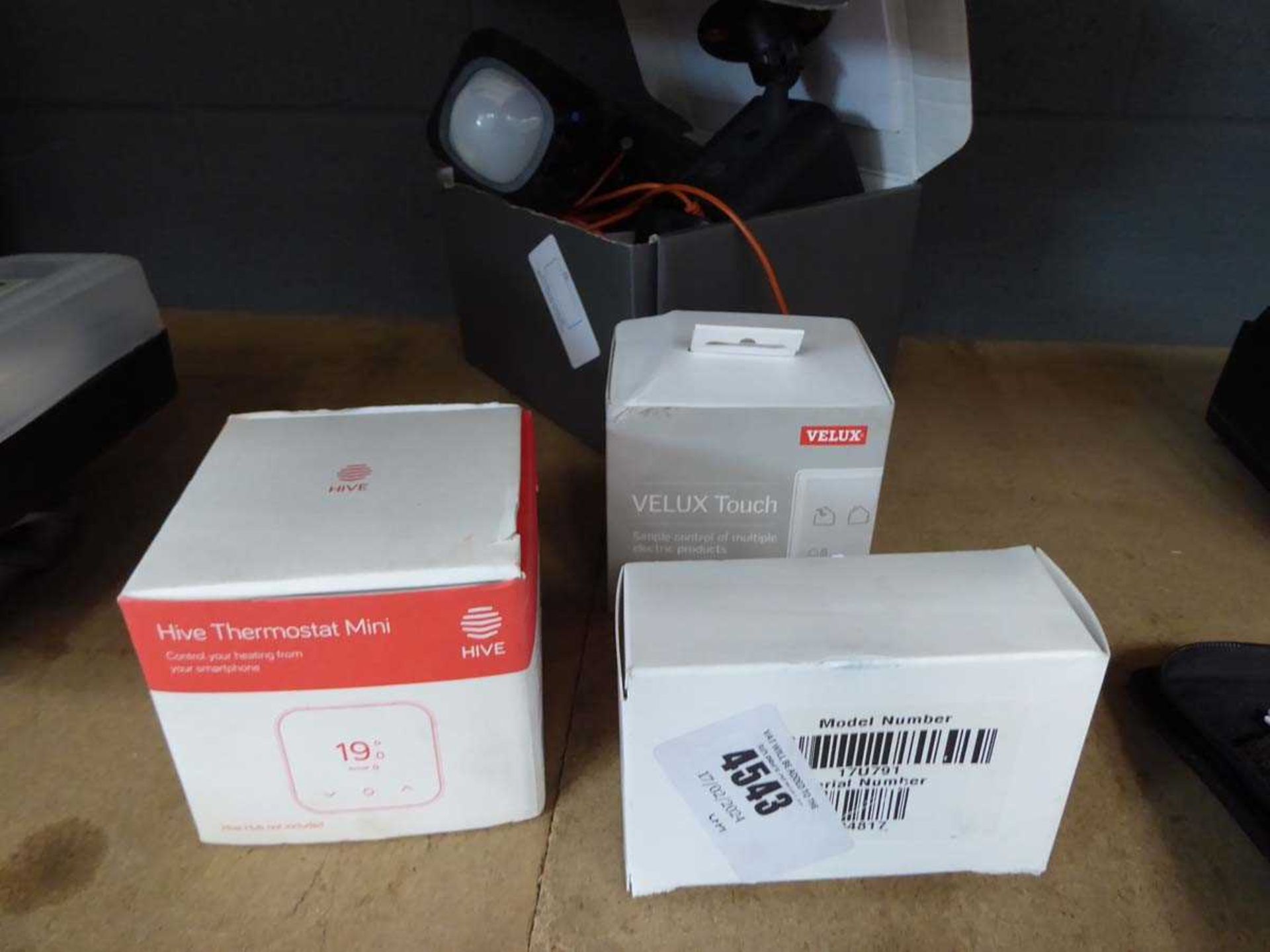 +VAT Ring spotlight camera, Velux control unit, Hive mini unit and a battery