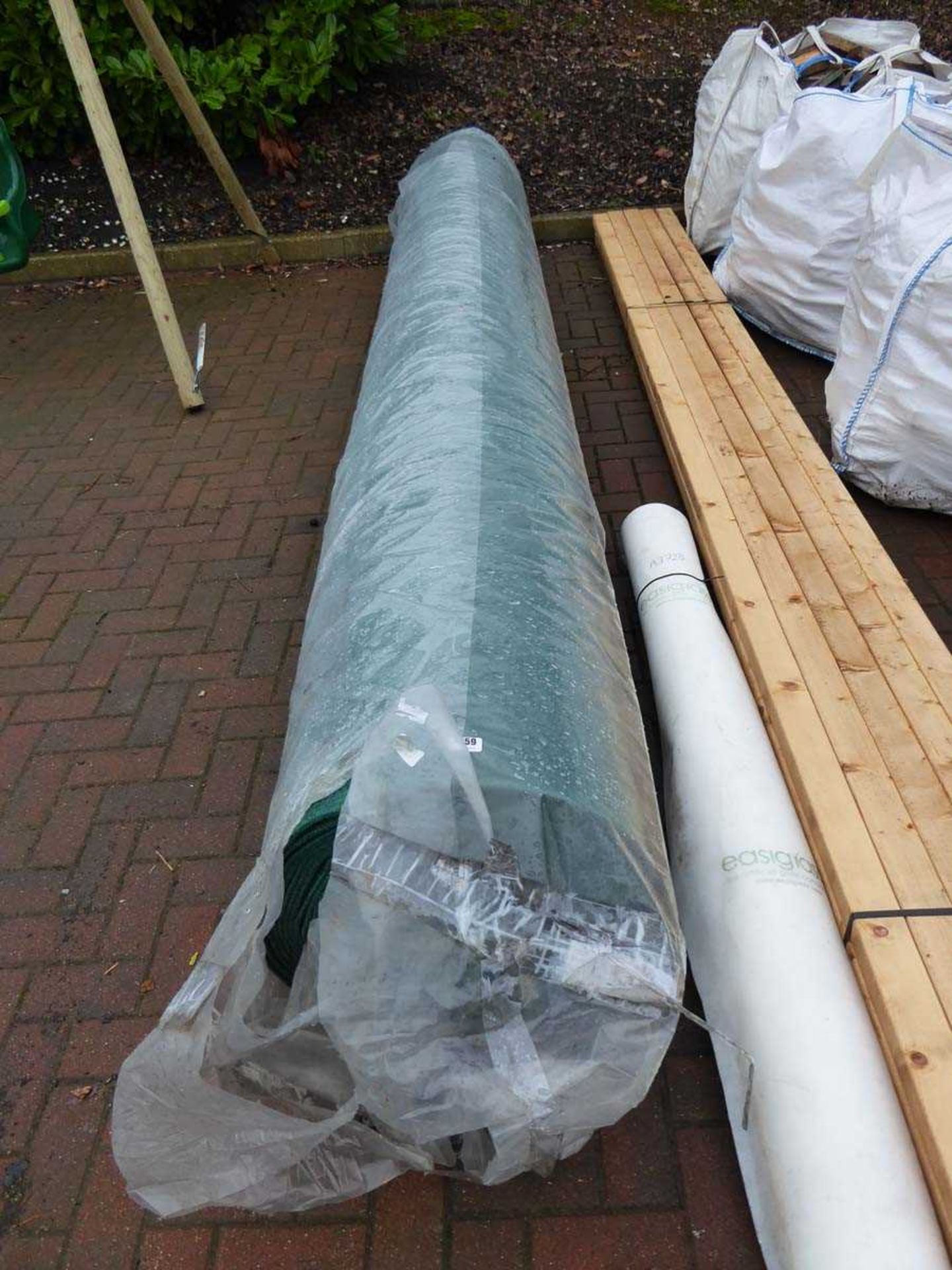 Large roll of heavy duty industrial green matting