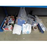 Underbay of assorted items including silicone, block salt, sky light blinds, etc