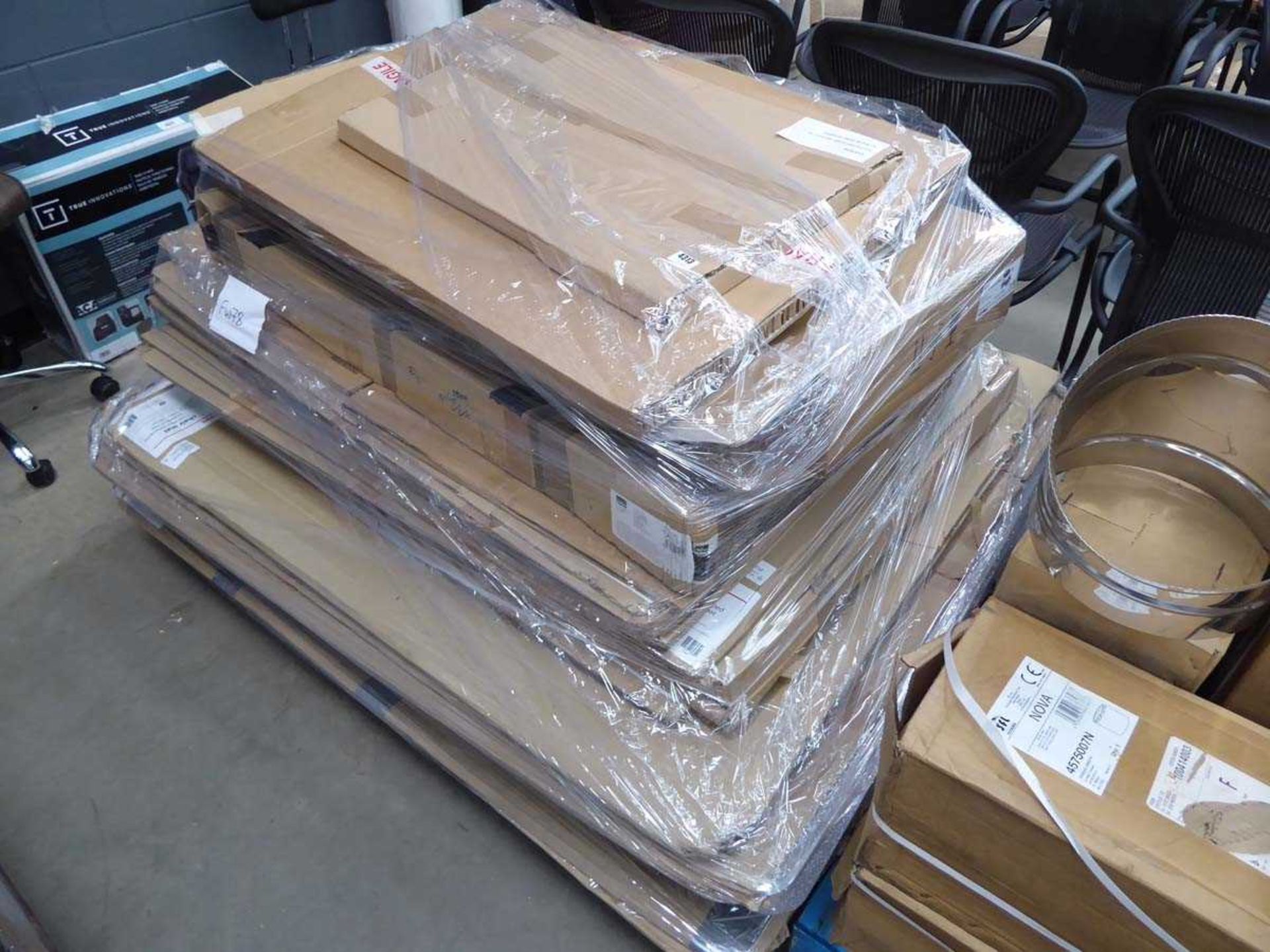 Pallet of floor protectors and assorted whiteboards