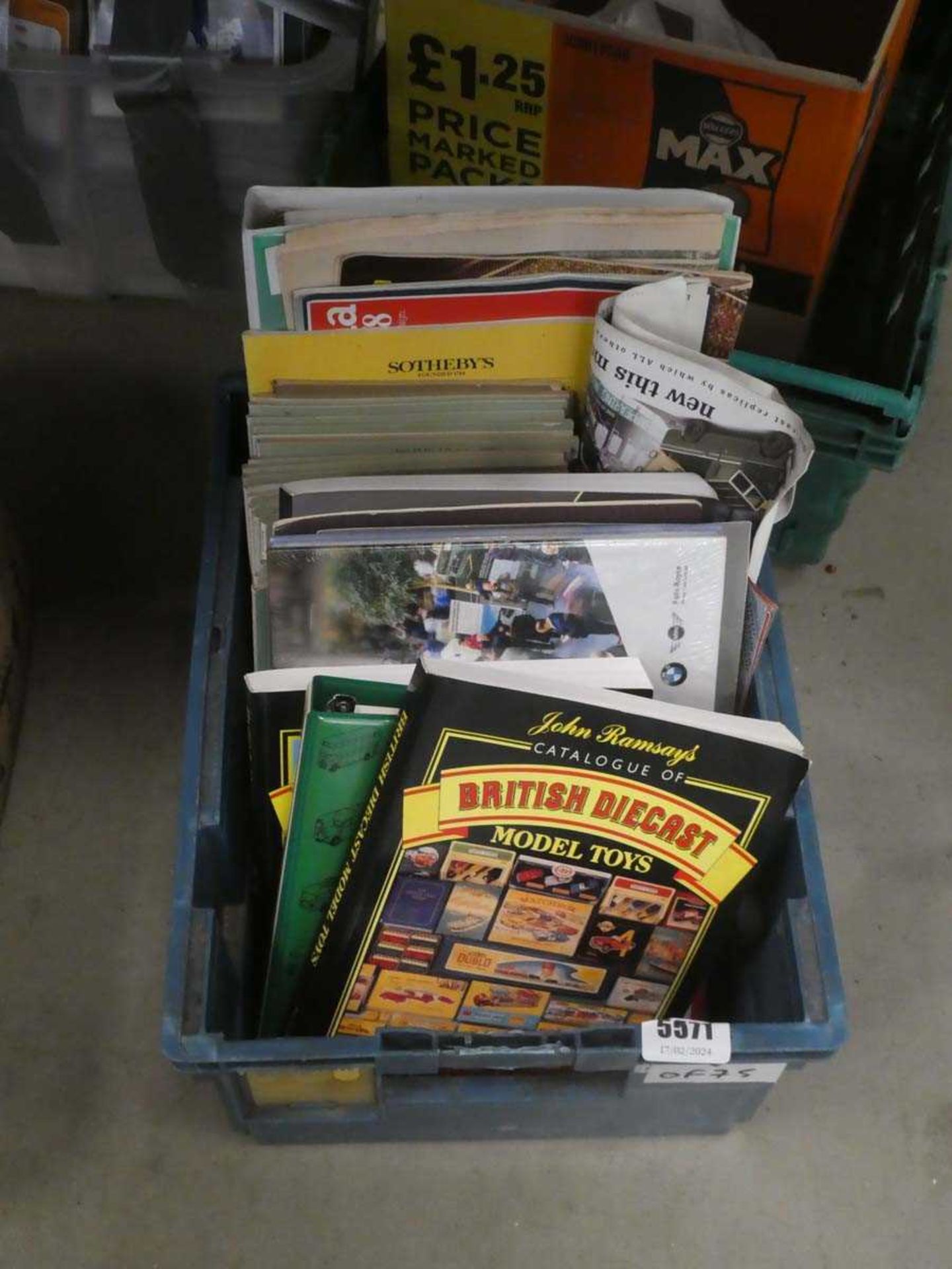 Box containing medical science reports, plus diecast reference books