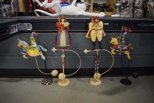 Set of four rocking ornaments modelled as a king, queen, knight and maiden