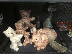 Cage containing floral patterned bears and a rabbit plus a Scottie dog, pipe and a glass bell