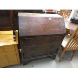 Oak bureau with 3 drawers under