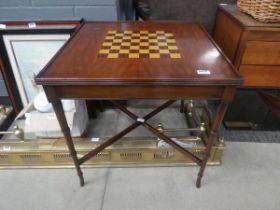 Chess board table with X shaped stretchers Measures w.62cm d.62cm h.62cm