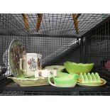 Cage containing horse related collectors plates, plus a jug and Carlton Ware crockery