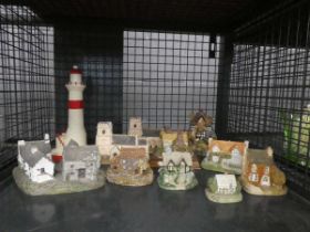 Cage containing a quantity of Lilliput Lane style cottages