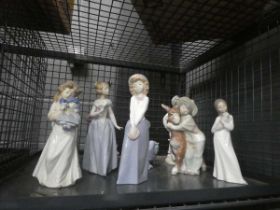 Cage containing Nao and Lladro figures
