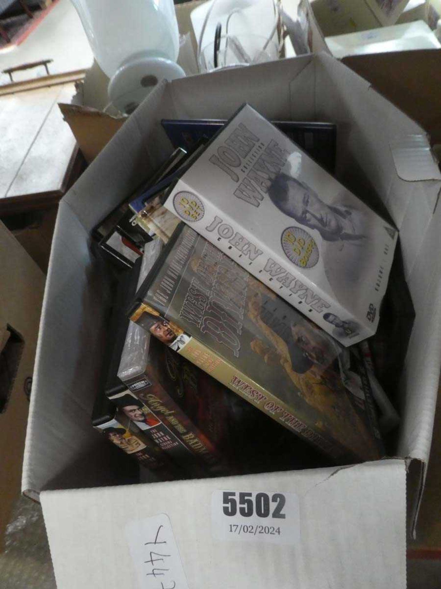 Box containing DVDs