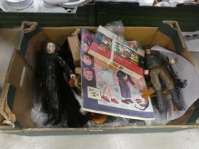 Box containing a childs abacus, action man and other figures