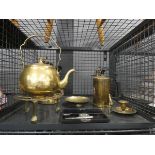 Cage containing brass ware to include a kettle, trivet, blow torches and a candlestick
