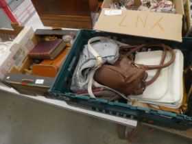 Two boxes containing binoculars, book, household ornaments and hand bags